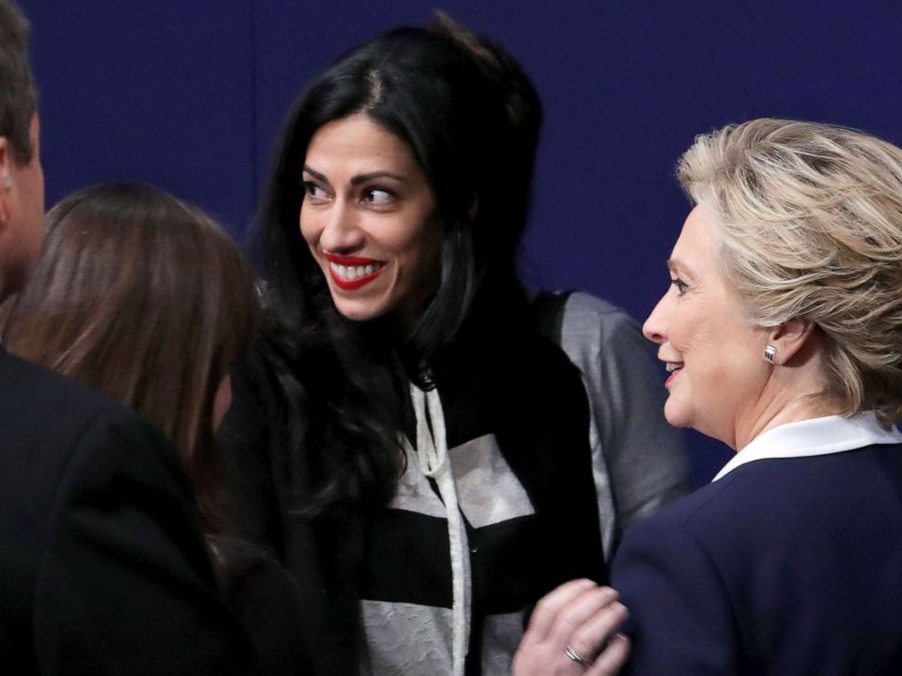 PHOTO: Staffer Huma Abedin greets Democratic presidential nominee Hillary Clinton during the town hall debate at Washington University on Oct. 9, 2016, in St Louis.