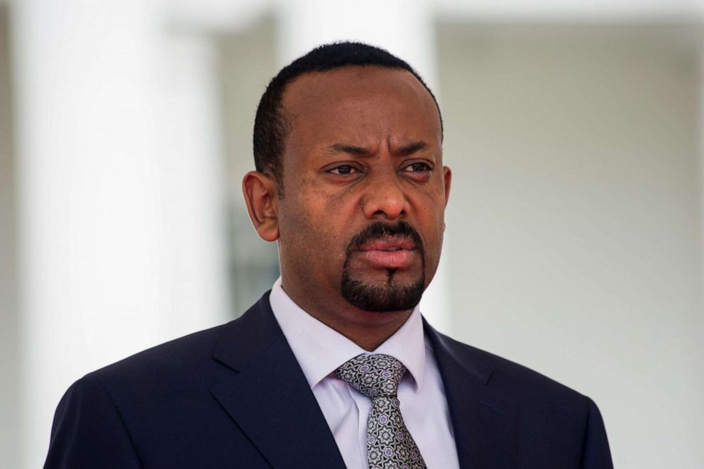 PHOTO: Ethiopia's Prime Minister Abiy Ahmed attends a welcome ceremony for his two-day state visit at State House in Entebbe, Uganda on June 8, 2018.