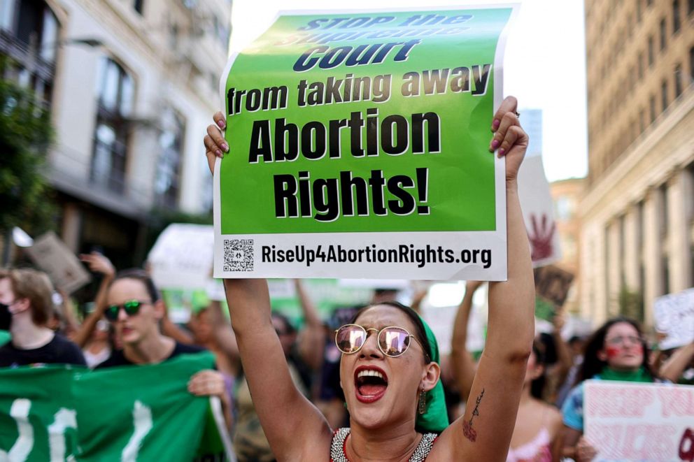 PHOTO: Abortion rights supporters march while protesting against the recent Supreme Court decision to end federal abortion rights protections, June 27, 2022, in Los Angeles.