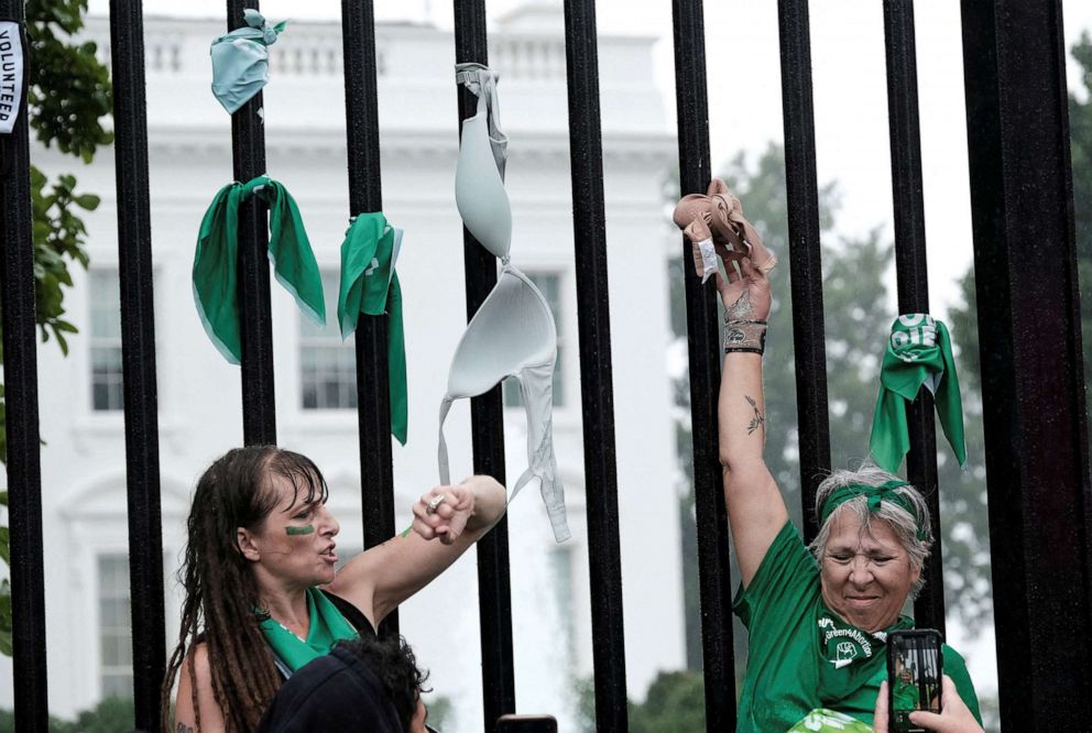 PHOTO: Activists put bras on the fence of the White House during a protest in the wake of the U.S. Supreme Court's decision to overturn the landmark Roe v. Wade abortion decision, in Washington, July 9, 2022. 