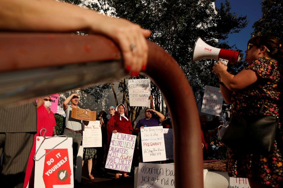 PHOTO: Abortion rights supporters protest in front of the Alabama State House as Alabama state Senate votes on the strictest anti-abortion bill in the U.S. at the Alabama Legislature in Montgomery, Ala., May 14, 2019.