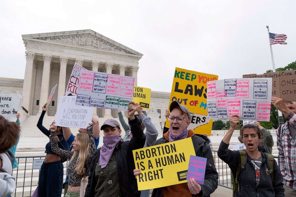 PHOTO: Demonstrators protest outside of the U.S. Supreme Court on May 3, 2022, in Washington, D.C.