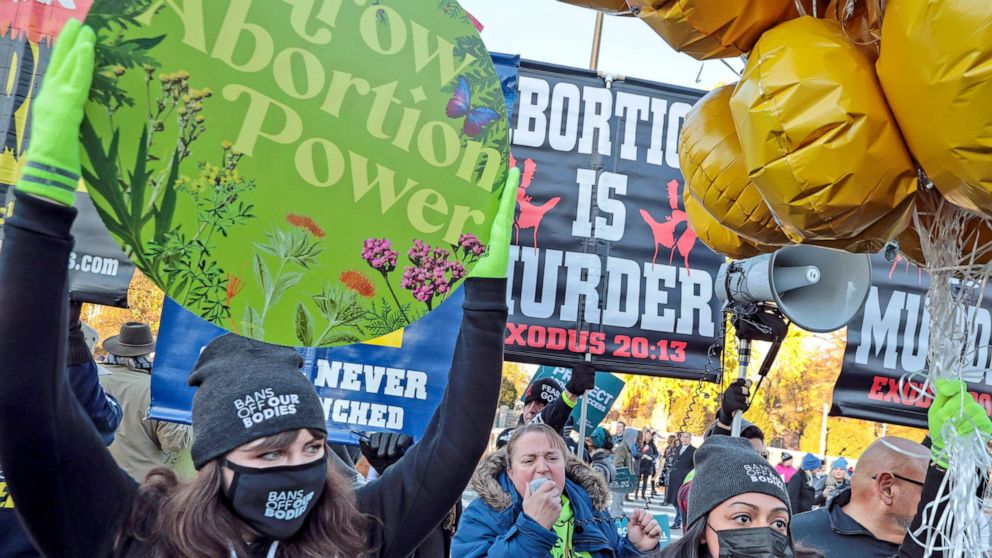 PHOTO: Protesters, demonstrators and activists gather in front of the U.S. Supreme Court as the justices hear arguments in a case about a Mississippi law that bans most abortions after 15 weeks, on Dec. 1, 2021 in Washington, D.C.