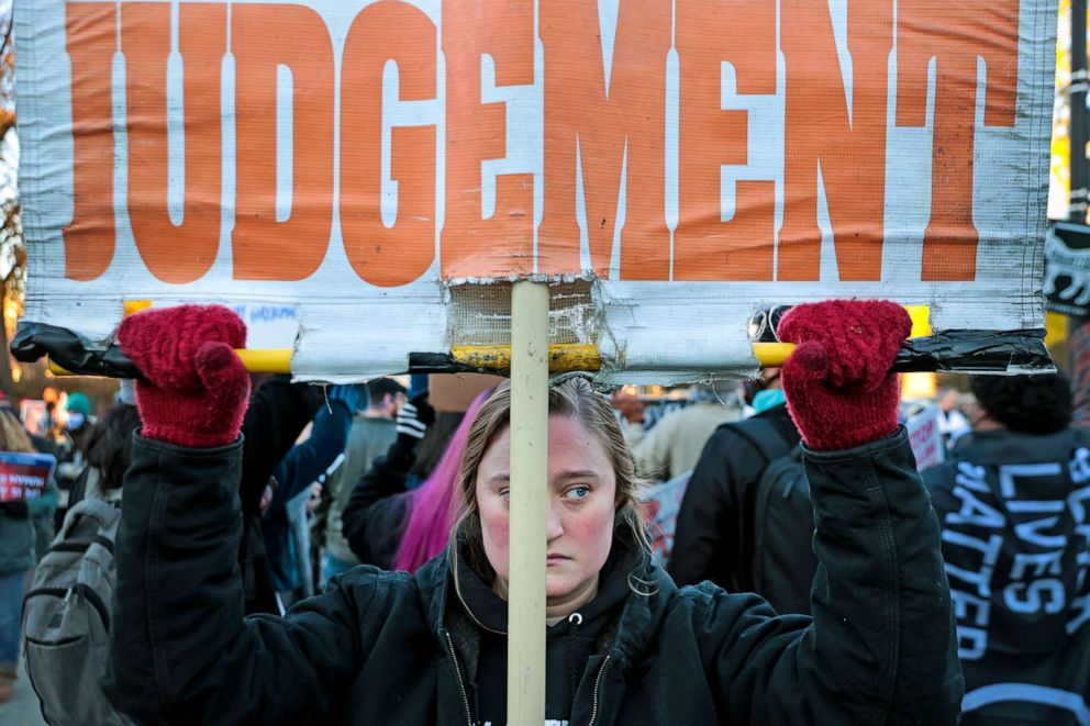 PHOTO: Protesters, demonstrators and activists gather in front of the U.S. Supreme Court as the justices hear arguments on a case about a Mississippi law that bans most abortions after 15 weeks, on Dec. 1, 2021 in Washington, D.C. 
