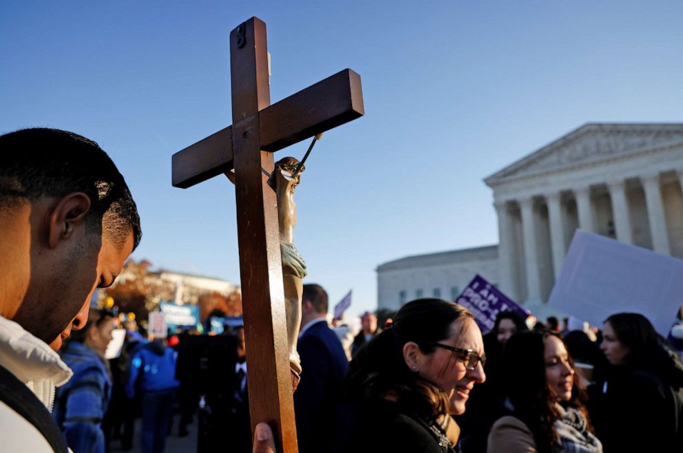 PHOTO: Protesters, demonstrators and activists gather in front of the U.S. Supreme Court as the justices hear arguments in a case about a Mississippi law that bans most abortions after 15 weeks, on Dec. 1, 2021 in Washington, D.C. 