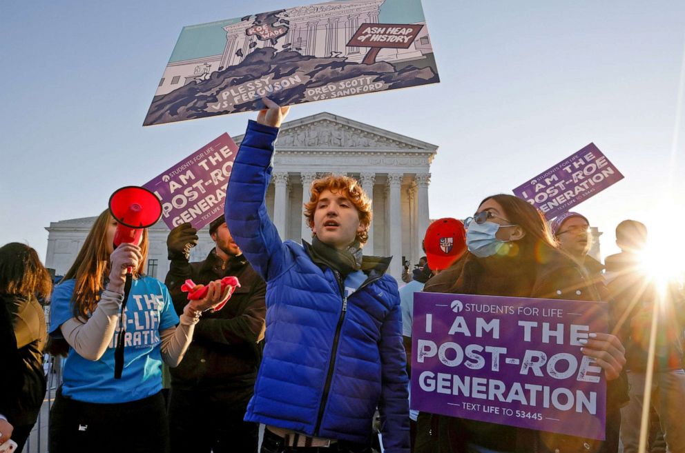 PHOTO: Protesters, demonstrators and activists gather in front of the U.S. Supreme Court as the justices hear arguments in a case about a Mississippi law that bans most abortions after 15 weeks, on Dec. 1, 2021 in Washington, D.C. 