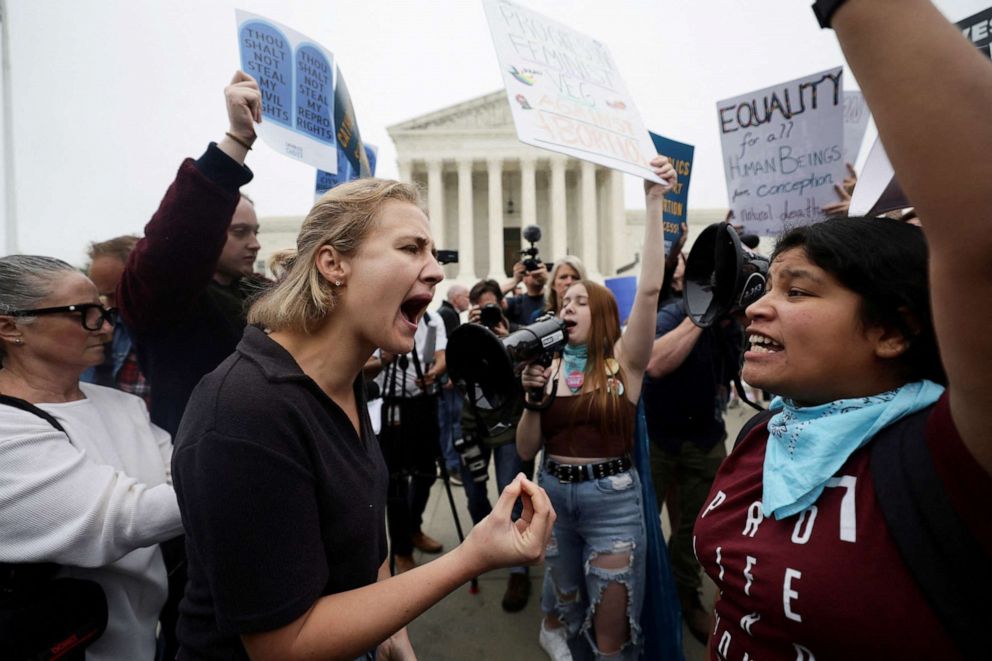 PHOTO: Abortion rights and anti-abortion demonstrators protest outside the U.S. Supreme Court in Washington, May 3, 2022.