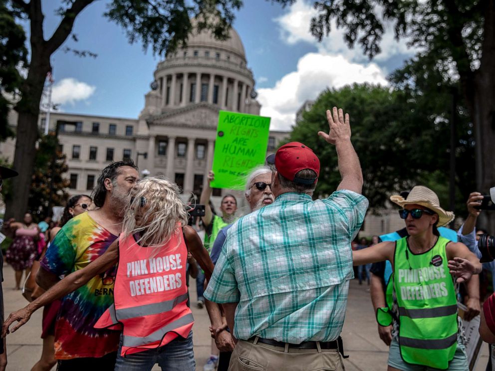 PHOTO: An abortion rights opponent wearing a red hat confronts a rally organized by Planned Parenthood Southeast against the abortion ban bills being legislated across the country, at the Mississippi State Capitol in Jackson, May 21, 2019.