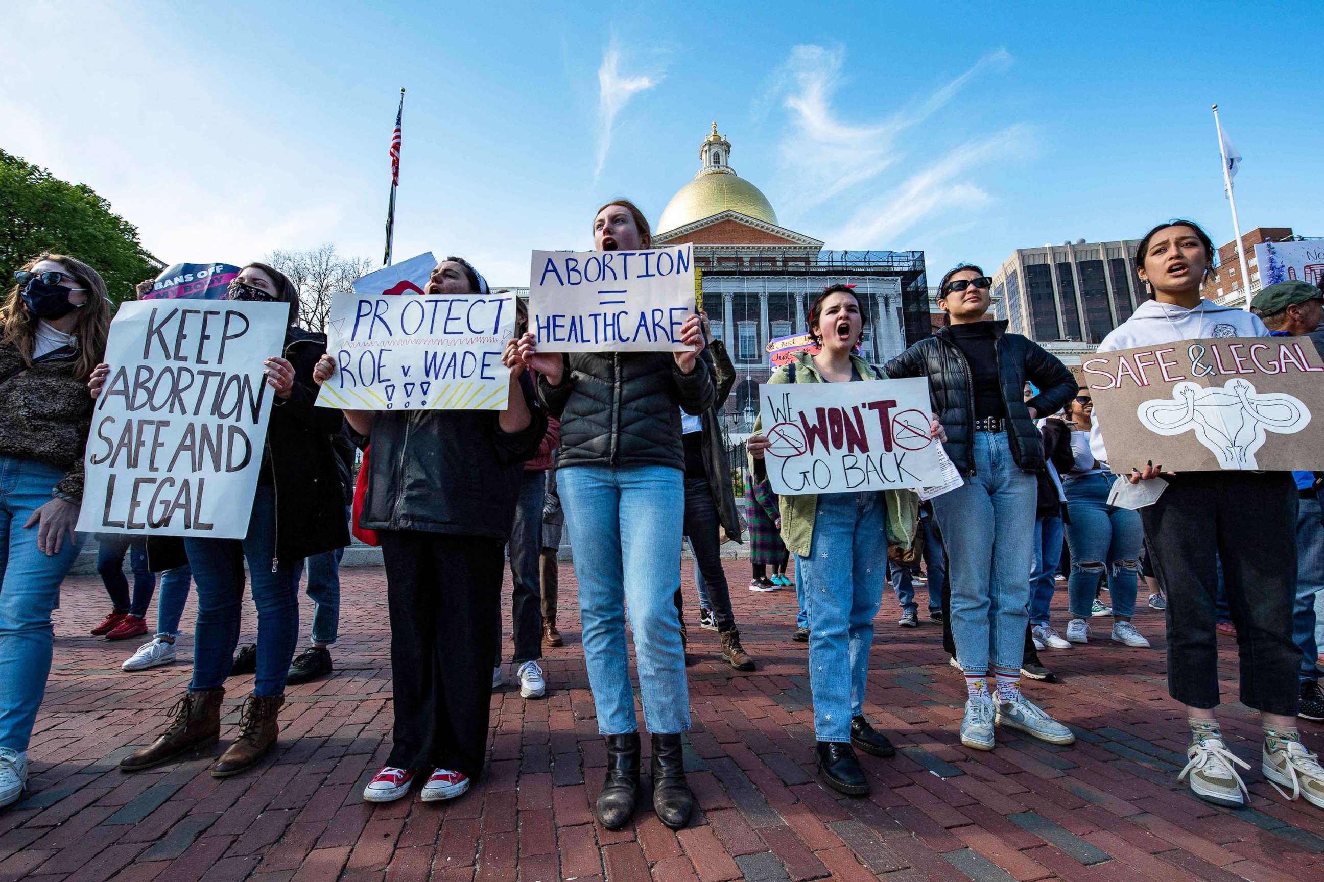 PHOTO: Abortion rights activists rally outside the State House during a Mother's Day Rally in Boston, on May 8, 2022.