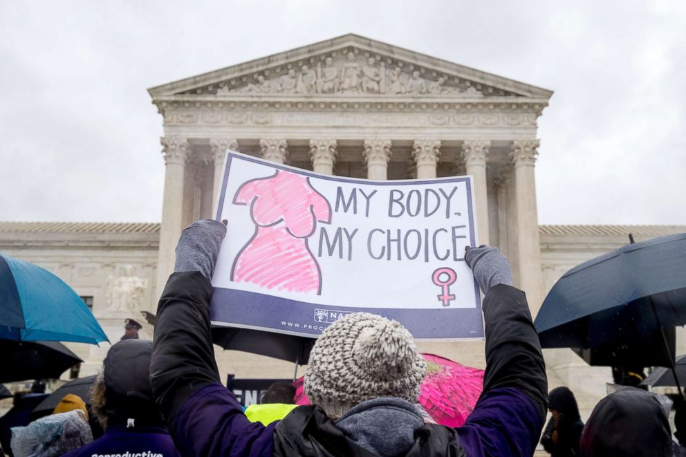 PHOTO: A pro-abortion rights supporter holds up a sign that reads "My Body. My Choice" during a rally outside the Supreme Court in Washington, March 20, 2018.