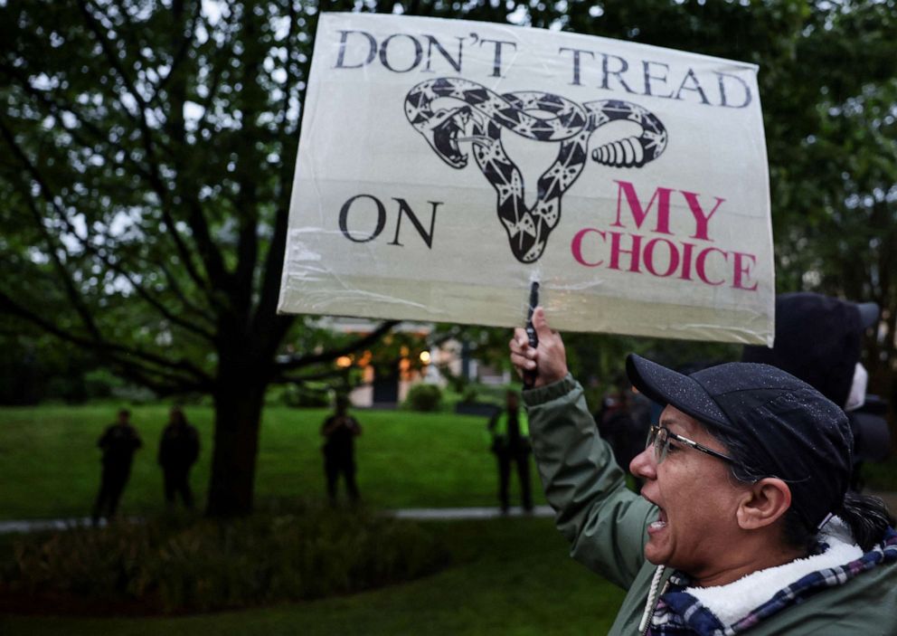PHOTO: Demonstrators in support of reproductive rights protest outside of Supreme Court Justice John Robert's home in Chevy Chase, Maryland, near Washington, D.C., May 7, 2022.