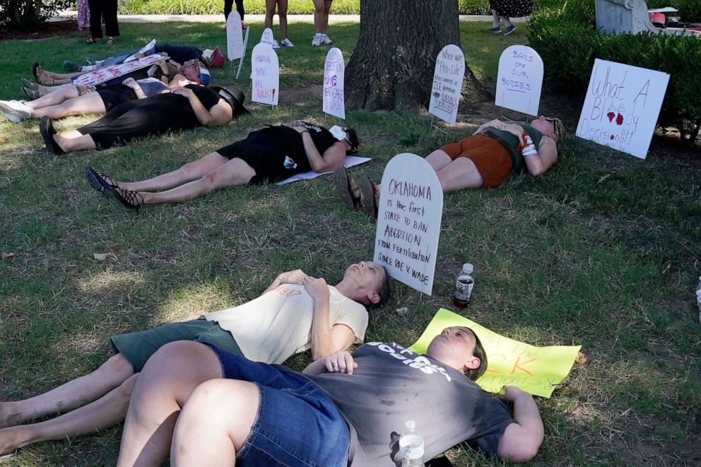 PHOTO: Protestors take part in a "die in" on June 24, 2022, in Norman, Okla., following the Supreme Court's decision to overturn Roe v. Wade.