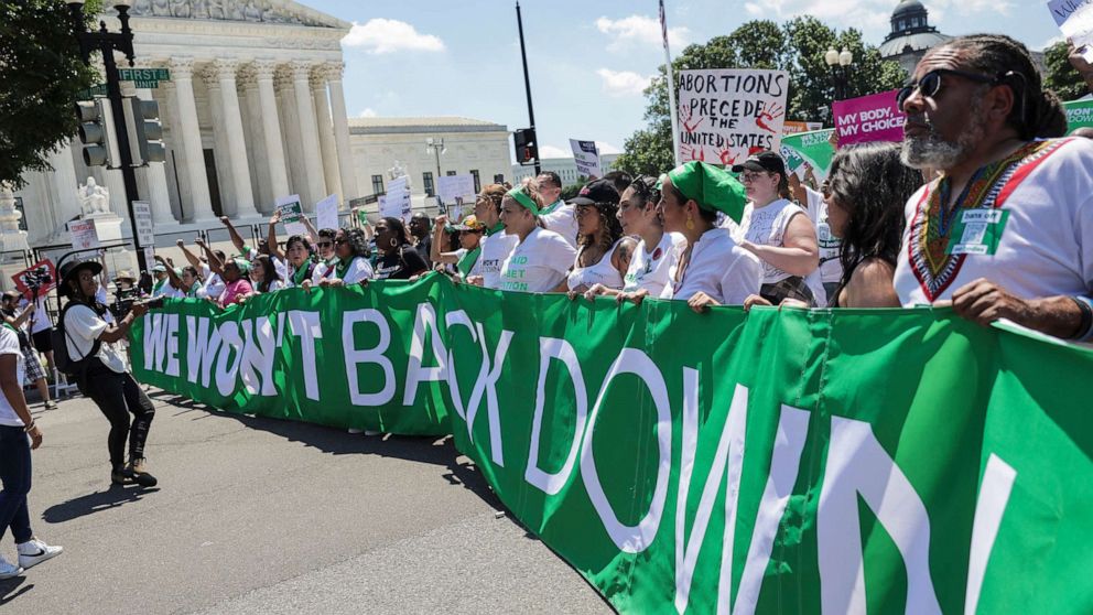PHOTO: In this June 30, 2022, file photo, abortion rights activists protest outside the U.S. Supreme Court on the last day of their term, in Washington, D.C.