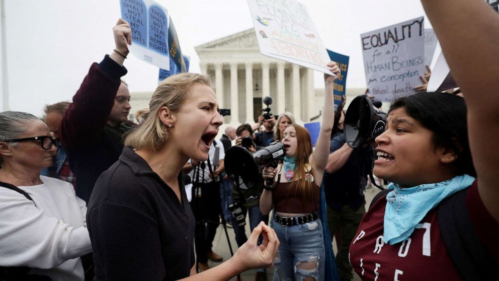PHOTO: Pro-abortion and anti-abortion demonstrators protest outside the U.S. Supreme Court in Washington, May 3, 2022.