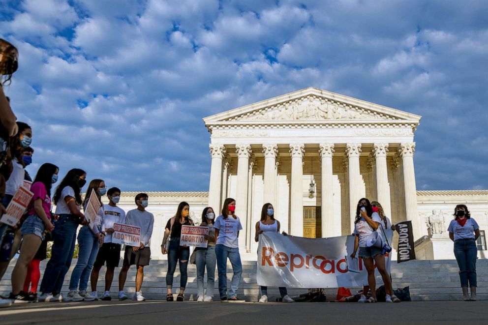 PHOTO: Members of the abortion rights group Reproaction demonstrate outside the U.S. Supreme Court in Washington on Sept. 9, 2021.