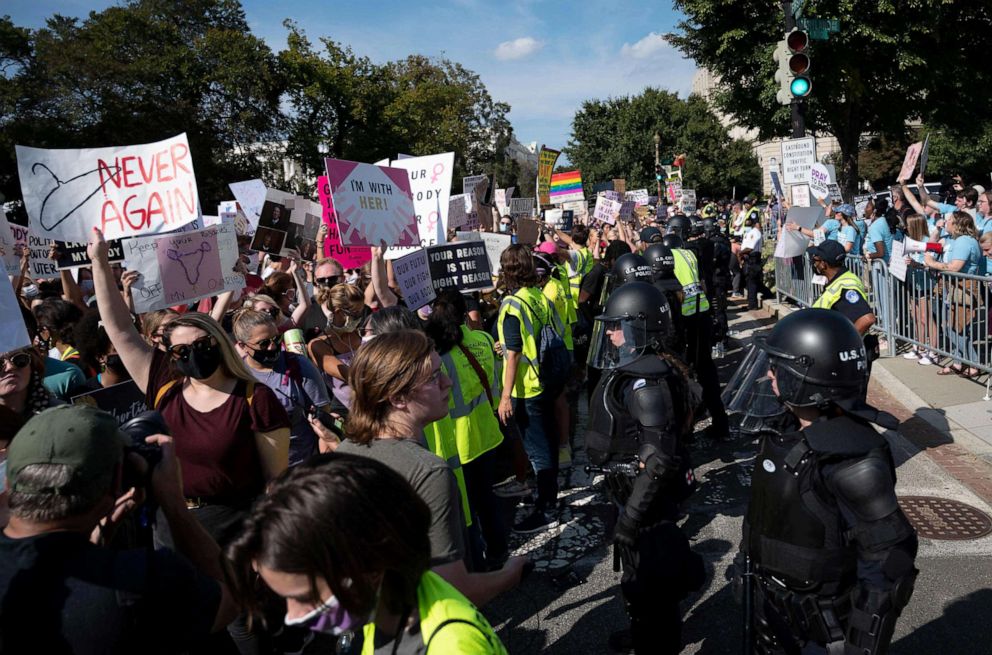 PHOTO: Protesters take part in the Women's March and Rally for Abortion Justice at the US Supreme Court in Washington, DC, Oct. 2, 2021.