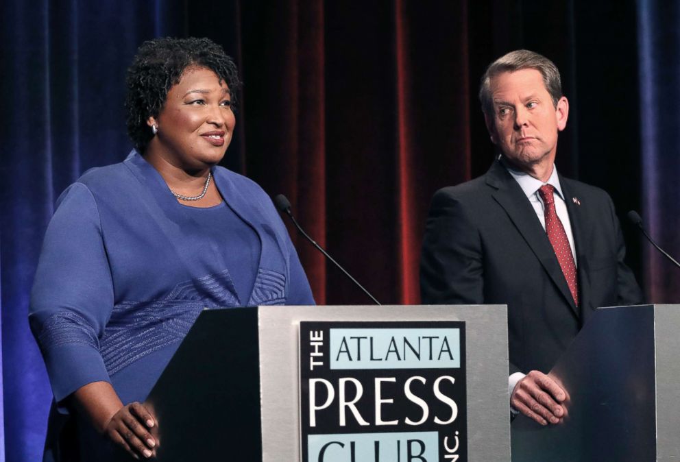 PHOTO: Stacey Abrams, Democratic Democrat Governor in Government, Left, speaks as her Republican opponent, Secretary of State Brian Kemp, listens to a debate in Atlanta on October 23, 2018.