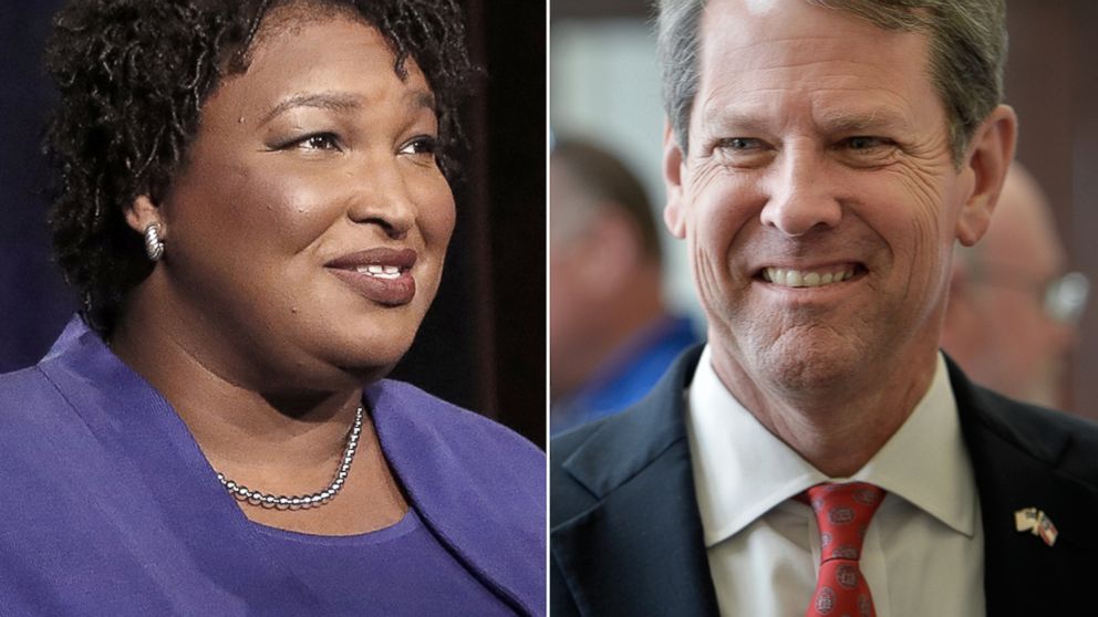 PHOTO: Democratic gubernatorial candidate for Georgia Stacey Abrams speaks during a debate in Atlanta, Oct. 23, 2018. Georgia Secretary of State Brian Kemp talks to voters during a rally in Augusta, Ga., July 23, 2018.