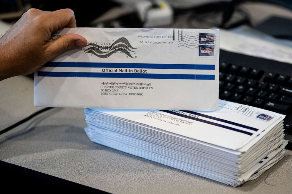 PHOTO: In this May 28, 2020, photo, Dave Turnier processes mail-in ballots at at the Chester County Voter Services office in West Chester, Pa., prior to the primary election. 