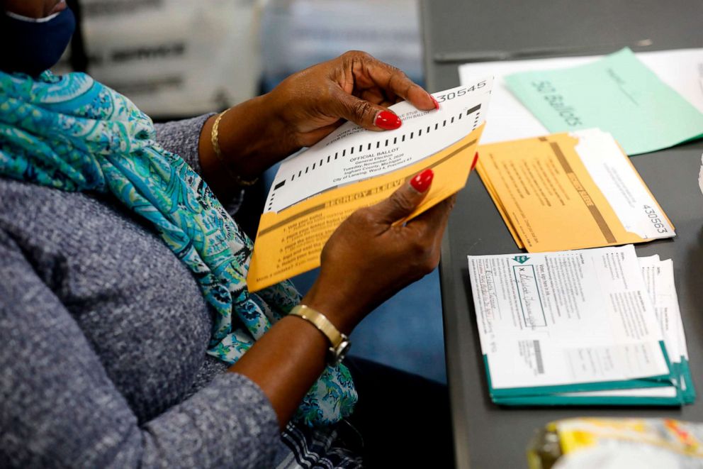 PHOTO: Workers start pre-processing absentee ballots at the city of Lansing Clerk's Election Unit on Nov. 2, 2020 in Lansing, Mich.