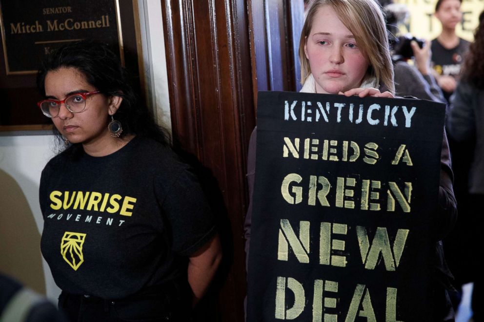 PHOTO: Activists with the Sunrise Movement protest at Senate Majority Leader Mitch McConnell's office in the Russell Senate building on Capitol Hill in Washington, DC, Feb. 25, 2019.