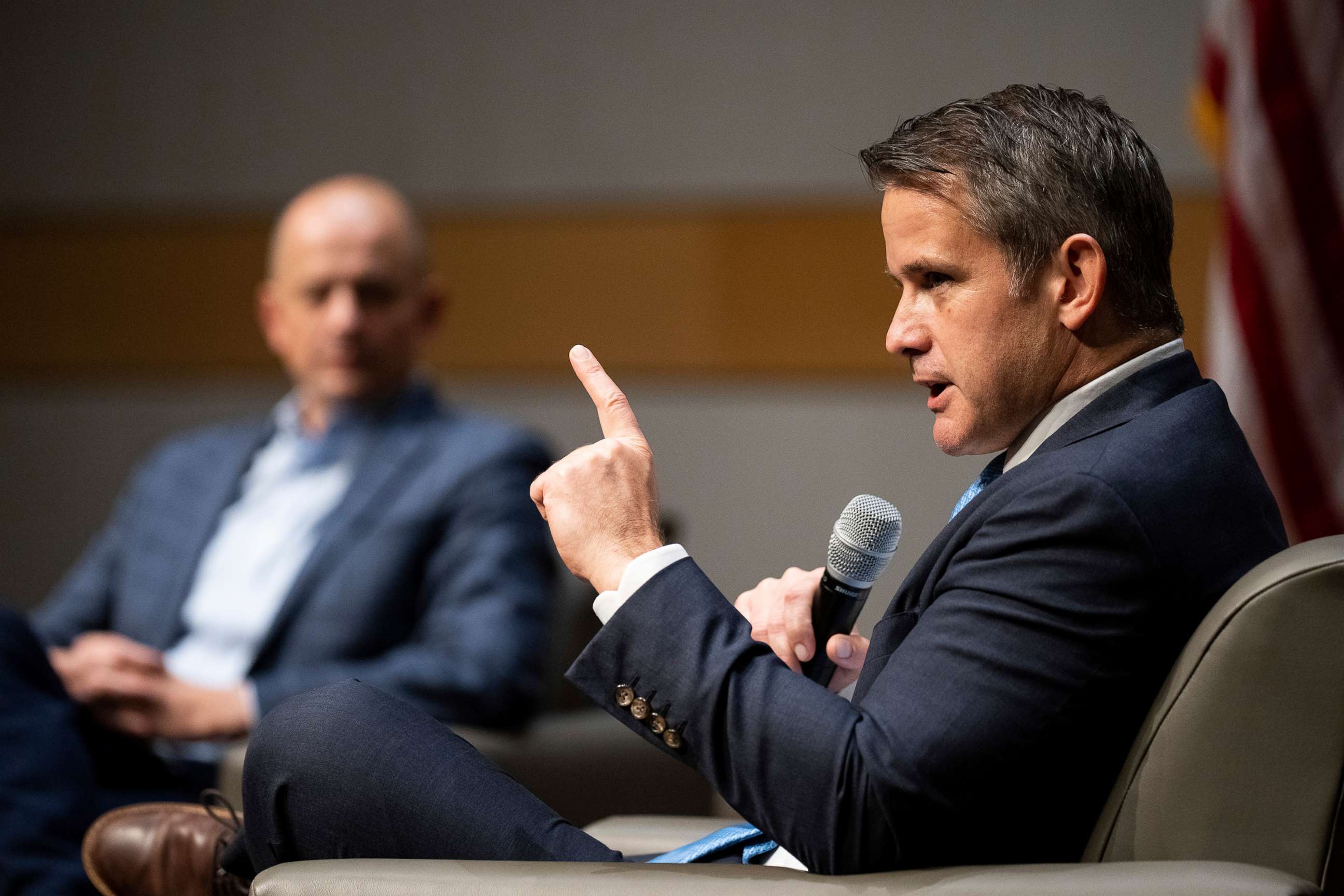 PHOTO: In this Oct. 20, 2022, file photo, Rep. Adam Kinzinger and Utah Senate candidate Evan McMullin hold a discussion on Democracy and the future of the American political system at the Salt Lake City Public Library in Salt Lake City.