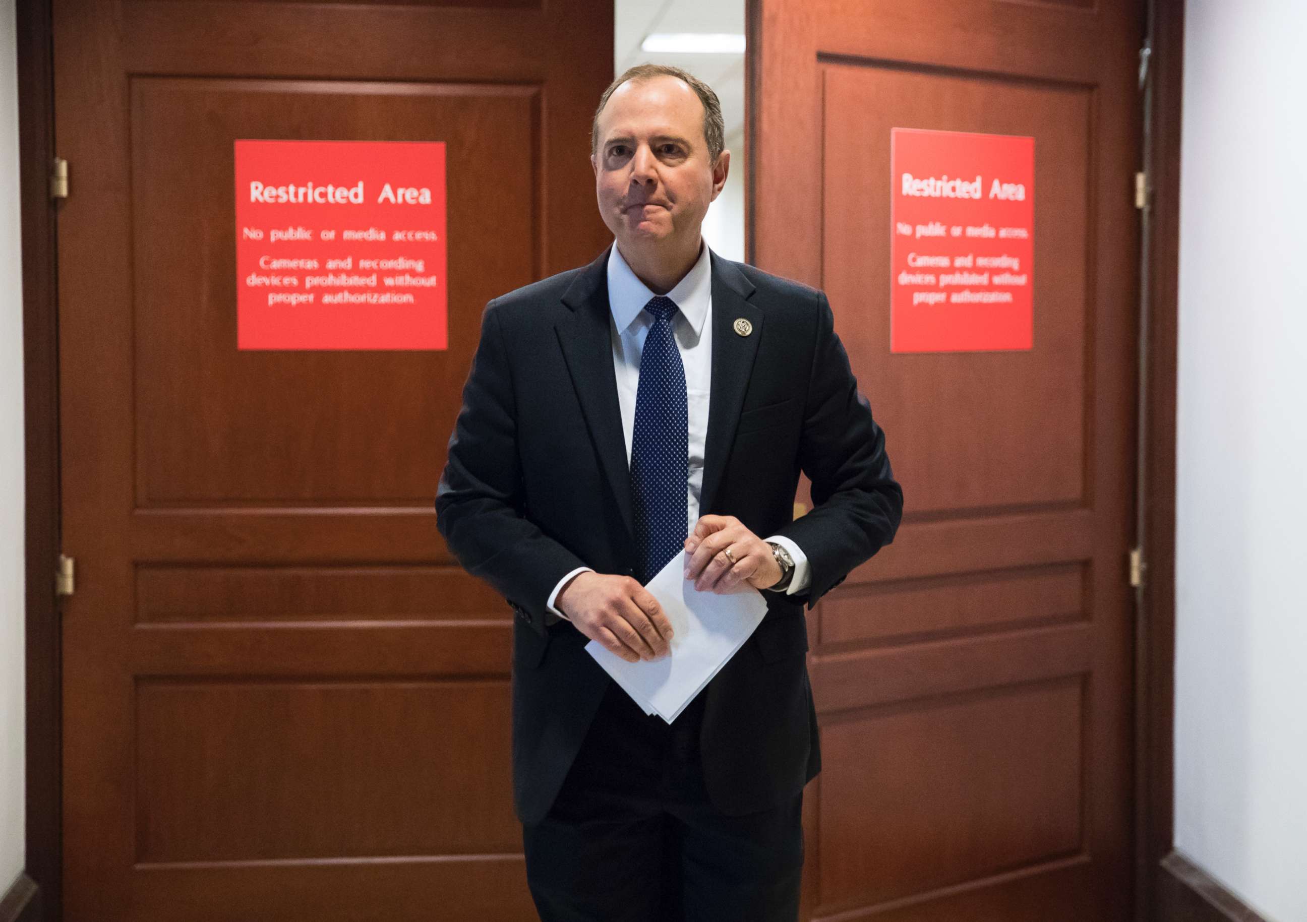 PHOTO: Rep. Adam Schiff, ranking member of the House Permanent Select Committee on Intelligence, leaves a secure area where the panel meets at the Capitol in Washington, D.C., Feb. 5, 2018. 