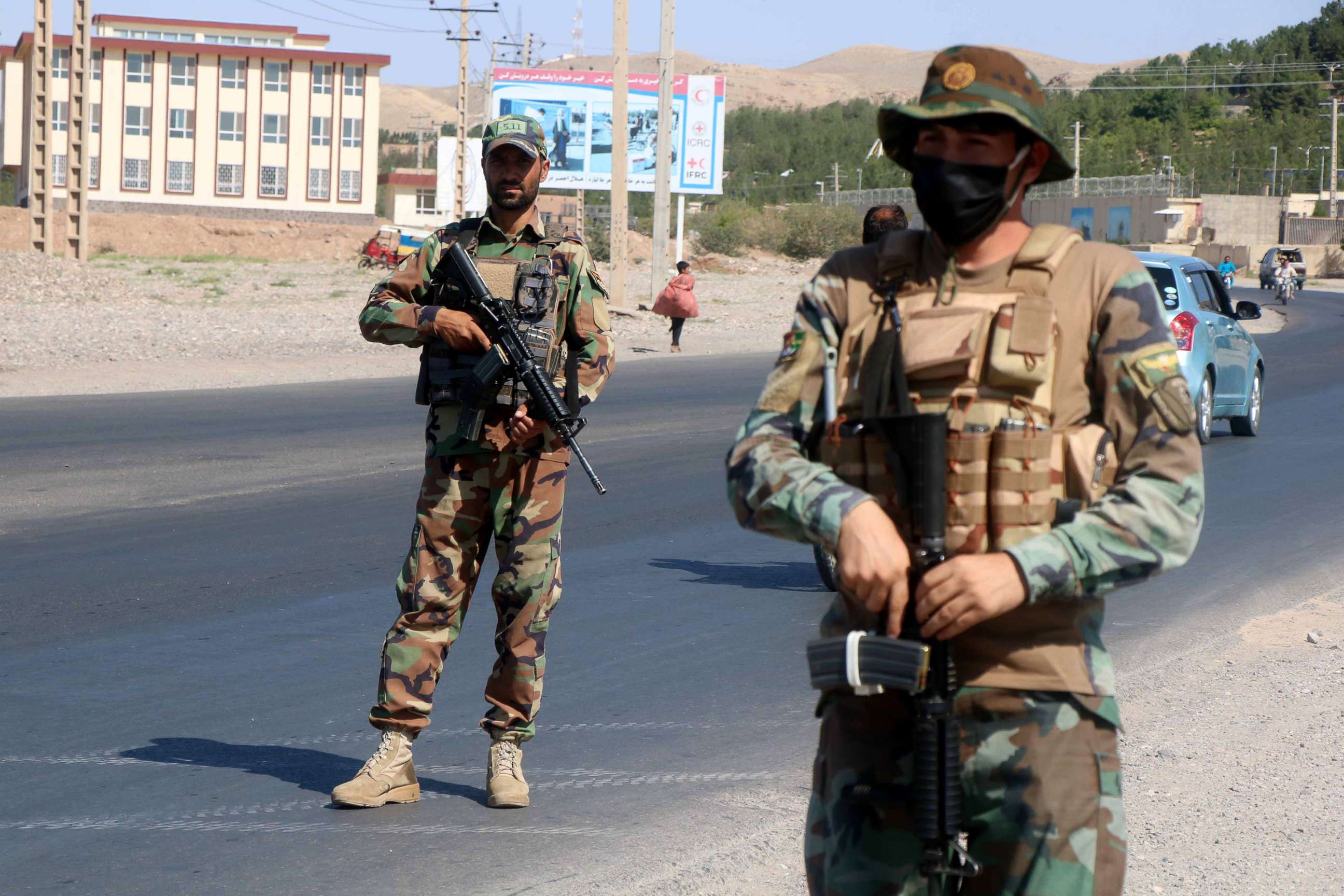 PHOTO: Afghan National Army soldiers stand guard on a road side check point in Herat, Afghanistan, July 3, 2021. 