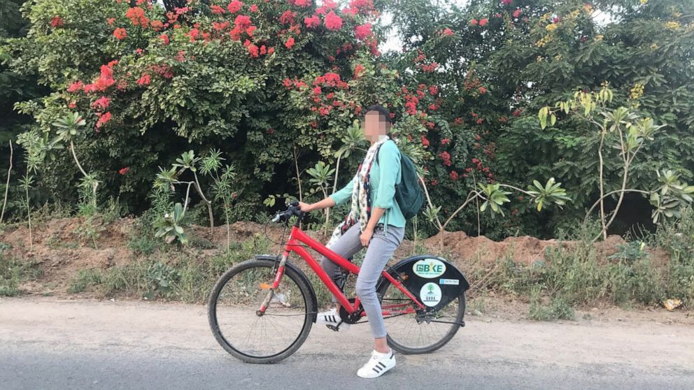 PHOTO: Zahra, whose name ABC News has changed for security concerns, rides a bike in Gujarat, India, in 2018.