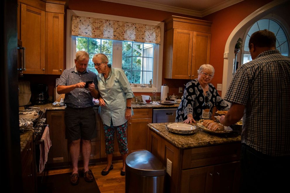 PHOTO: At her home in Staunton, Va., Bruce Hemp, second from left, and members of her church discuss plans to welcome and host Afghan refugees on Sept. 11, 2021.