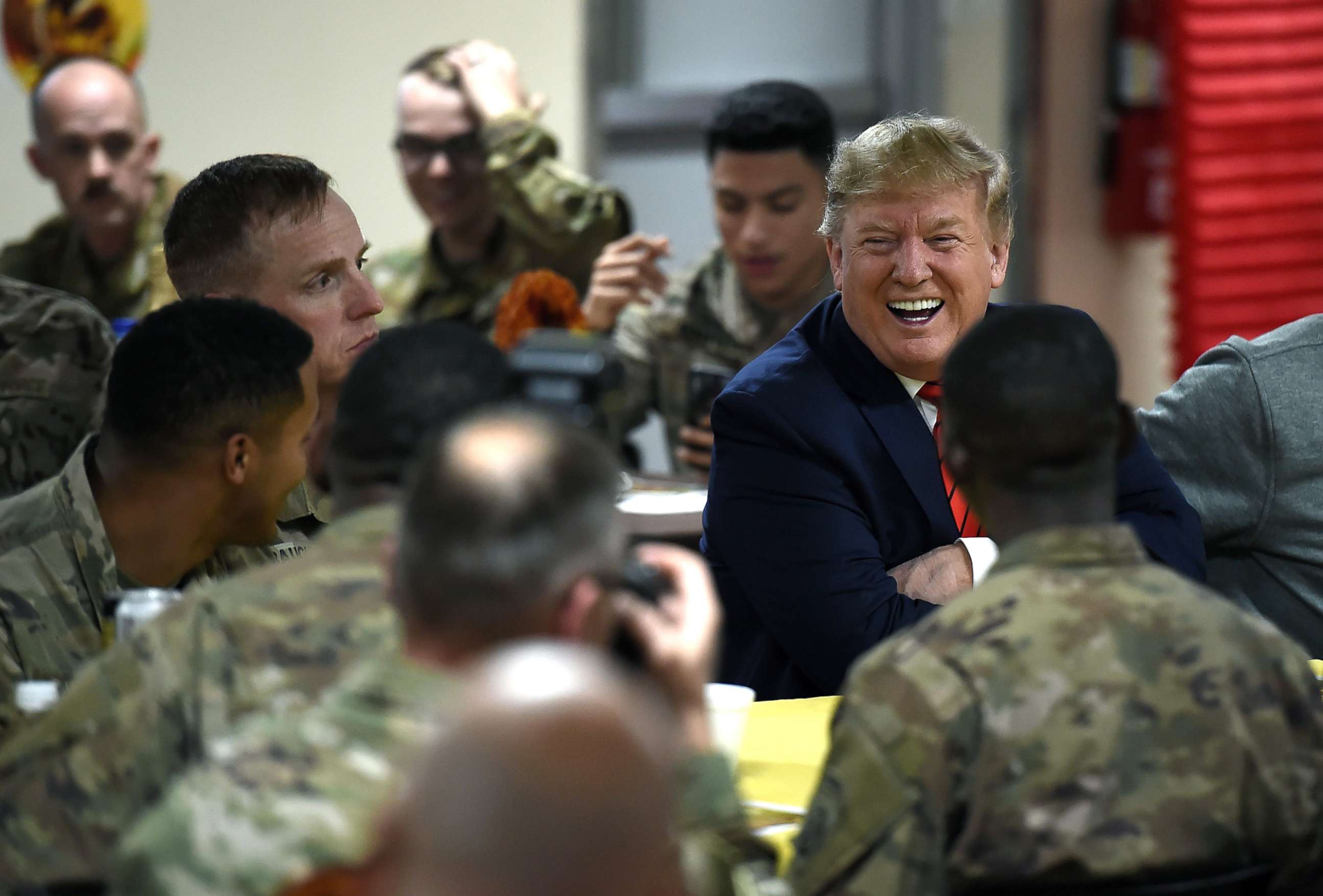 PHOTO:President Donald Trump serves Thanksgiving dinner to US troops at Bagram Air Field during a surprise visit, Nov. 28, 2019, in Afghanistan. 