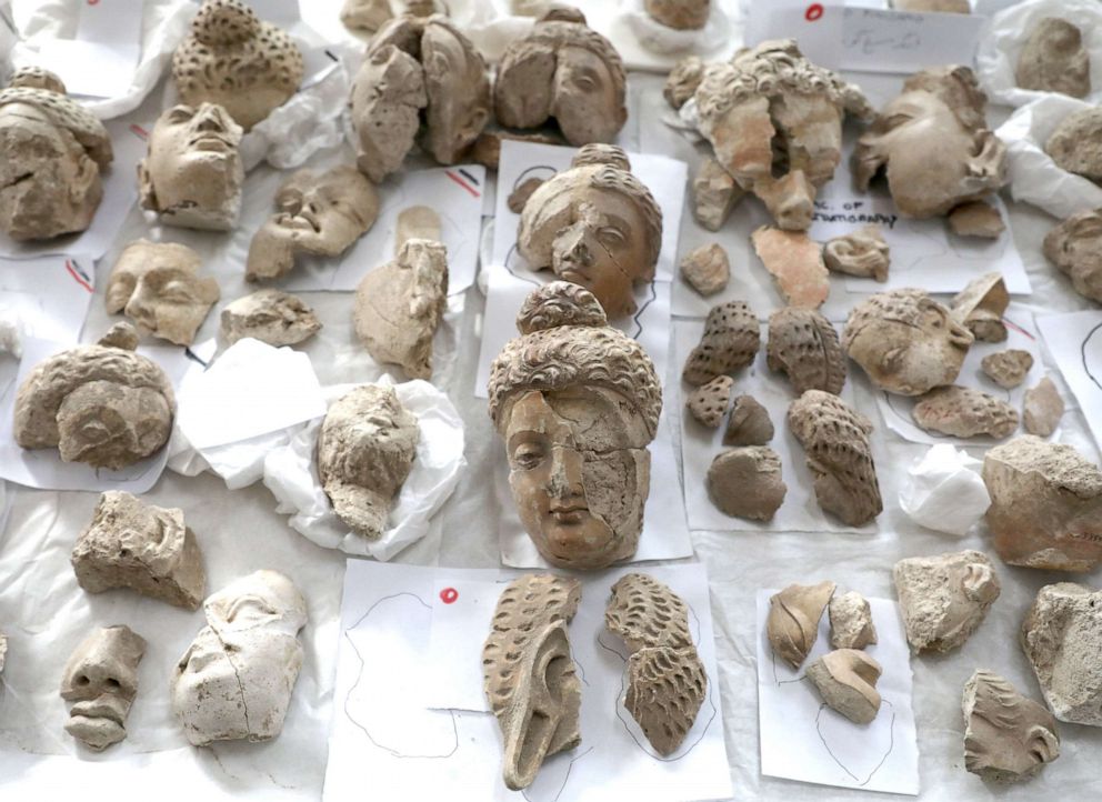 PHOTO: Pieces of statues damaged by the Taliban are laid out on a table for restoration at the National Museum in Kabul, Oct. 13, 2019.
