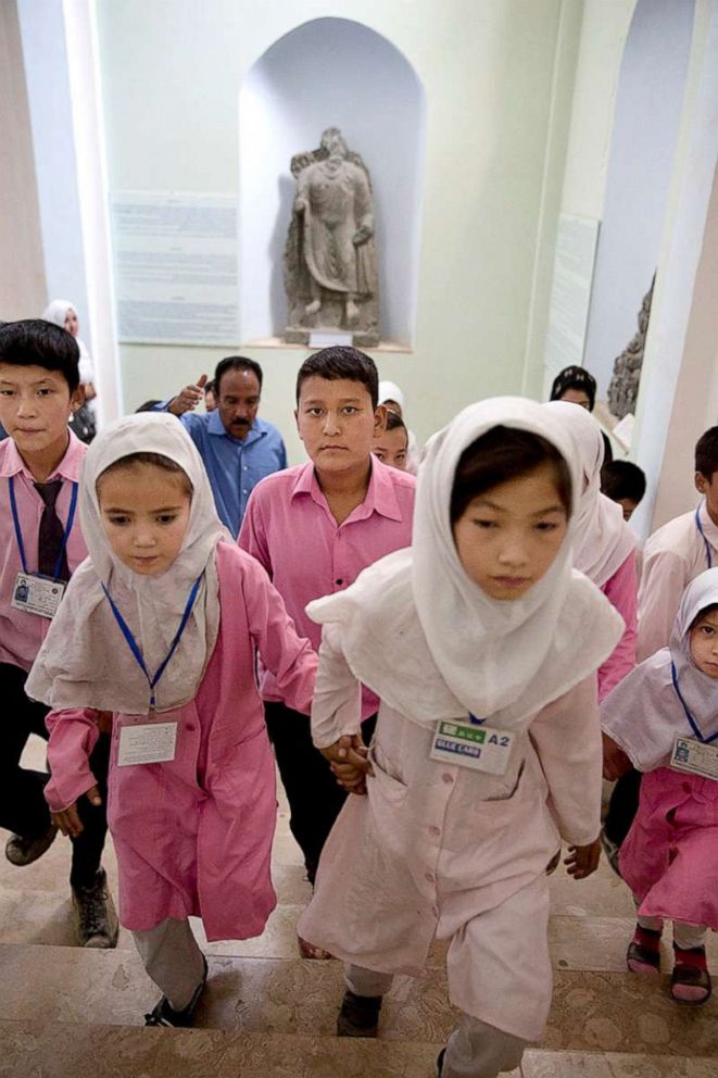 PHOTO: Students are guided past exhibits at the National Museum of Afghanistan Aug. 31, 2016 in Kabul.