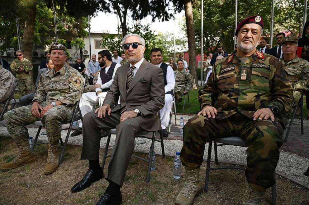 PHOTO: General Austin "Scott" Miller, Abdullah Abdullah, Afghanistan's High Council for National Reconciliation and Defense Minister General Bismillah Khan Mohammadi participate in an official handover ceremony in the Green Zone in Kabul on July 12, 2021.