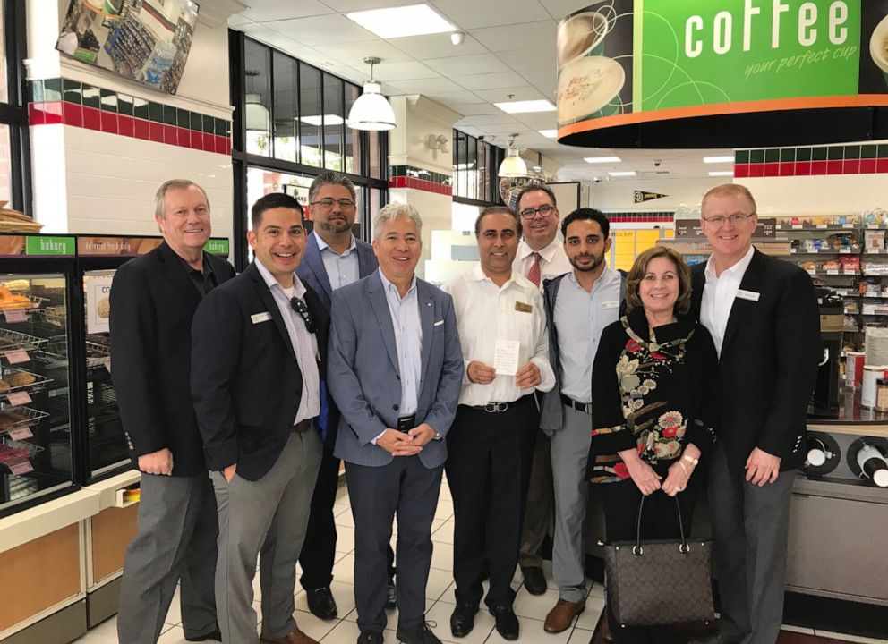 PHOTO: Prince Wafa meets with 7-11 executives at the San Diego store he's a co-partner in, in 2020.