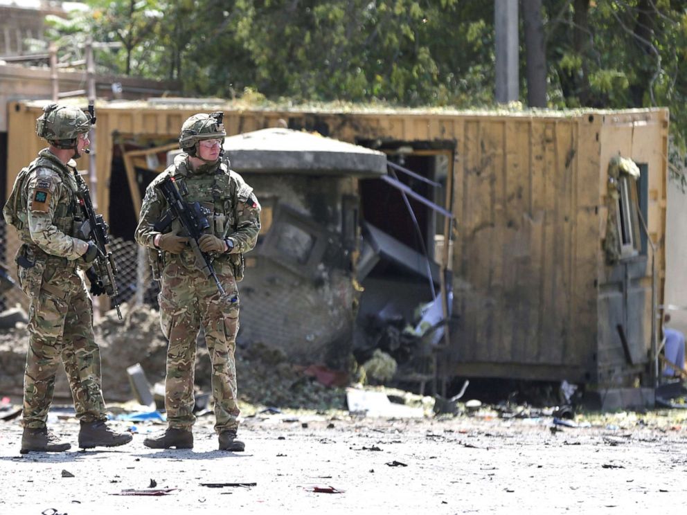 PHOTO: Foreign troops with NATO-led Resolute Support Mission investigate at the site of a suicide attack in Kabul, Afghanistan, Sept. 5, 2019.