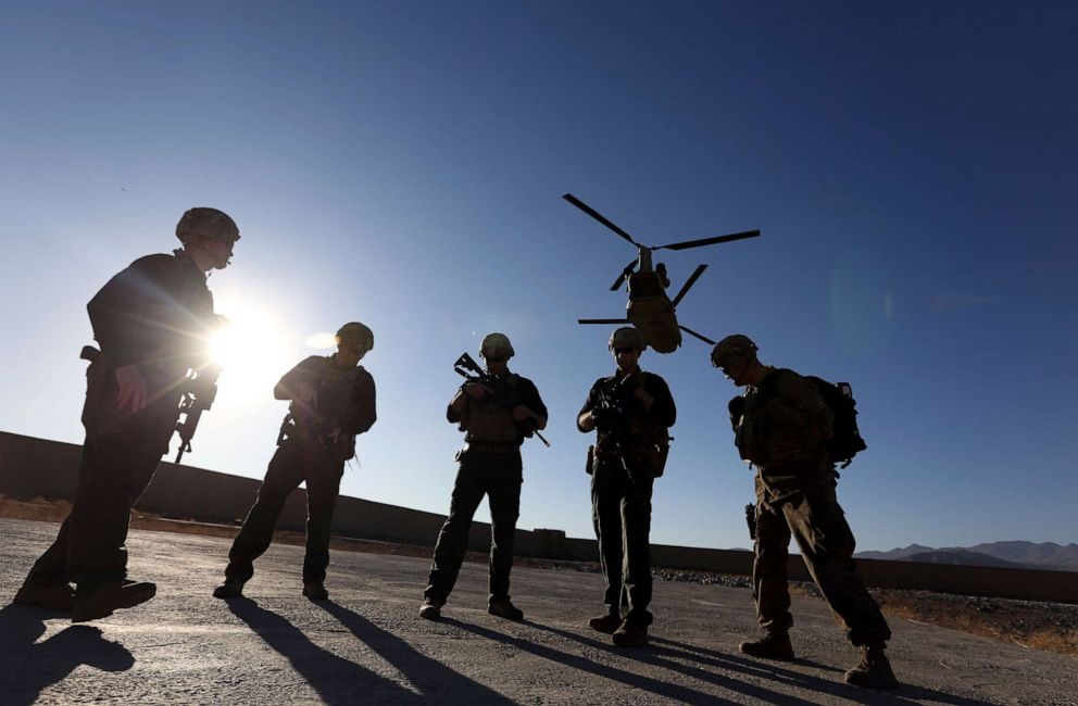 PHOTO: American soldiers wait on the tarmac in Logar province, Afghanistan, Nov. 30, 2017.