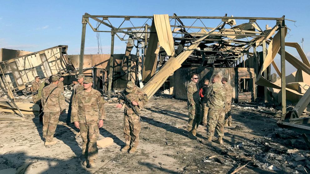 PHOTO: U.S. soldiers inspect the site where an Iranian missile hit at Ain al-Asad air base in Anbar, Iraq, Jan. 13, 2020.