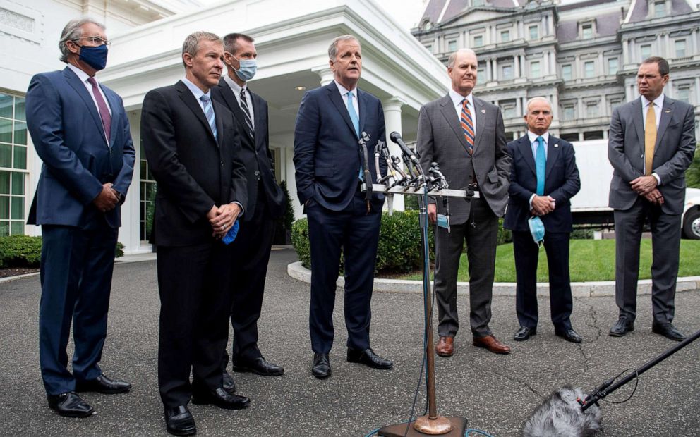 PHOTO: American Airlines chairman and CEO Doug Parker (center) speaks alongside other airline executives following a meeting at the White House, Sept.17, 2020.