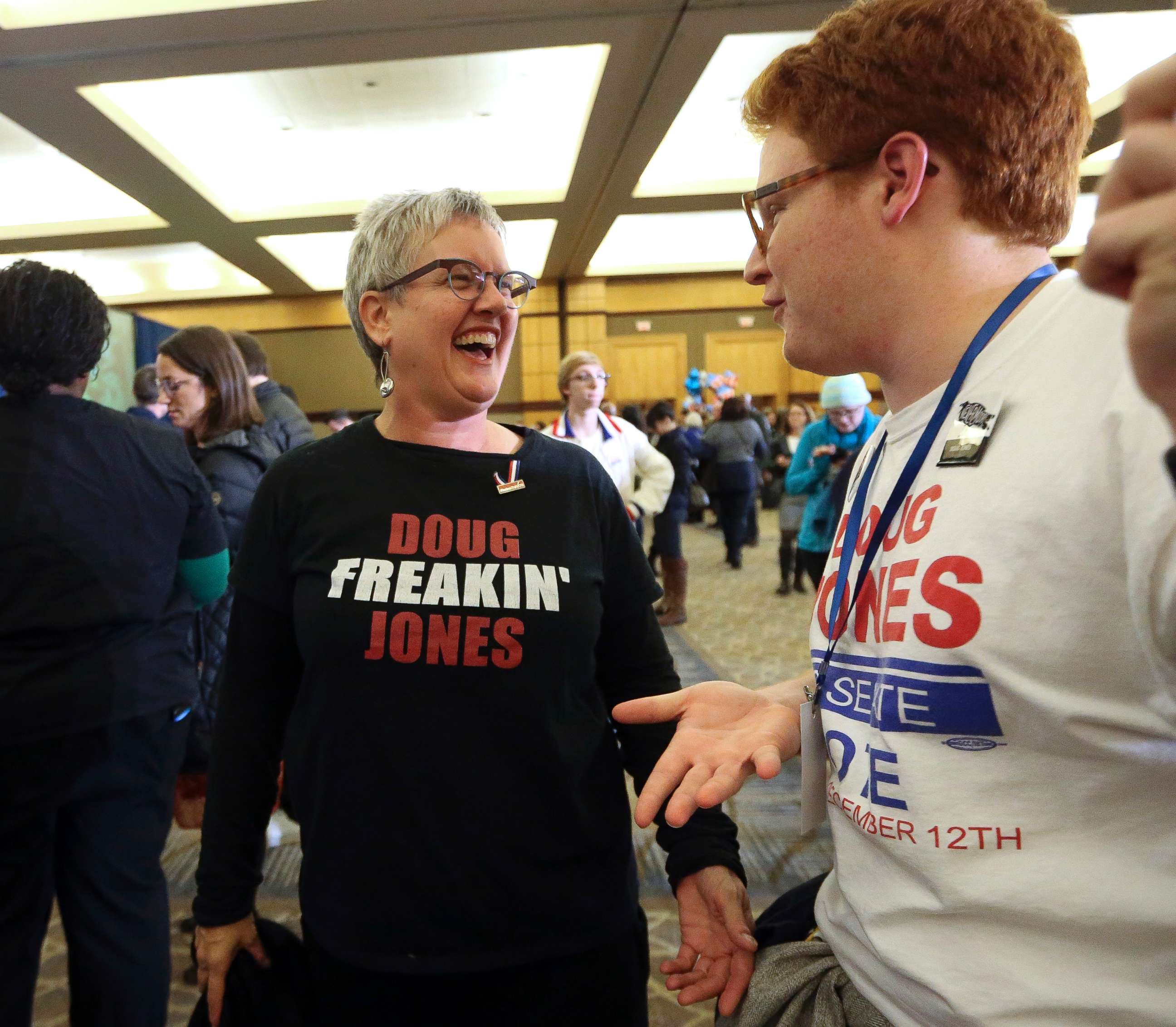 PHOTO: Frannie James talks with Connor Welch during an election-night watch party for Democratic candidate for U.S. Senate Doug Jones, Dec. 12, 2017, in Birmingham, Ala.