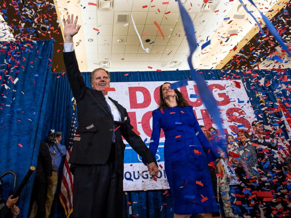 PHOTO: Senate candidate Doug Jones and his wife Louise greet supporters as he claims victory at his watch party in Birmingham, Ala., Dec. 12, 2017.
