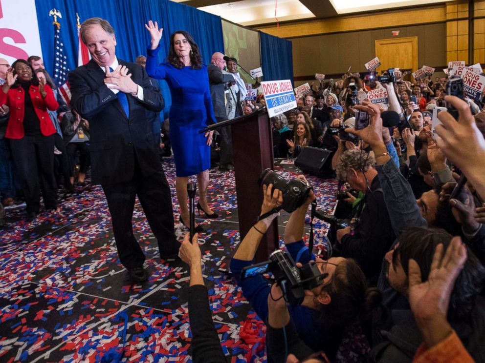 PHOTO: Senate candidate Doug Jones and his wife Louise greet supporters as he claims victory at his watch party in Birmingham, Ala., Dec. 12, 2017.