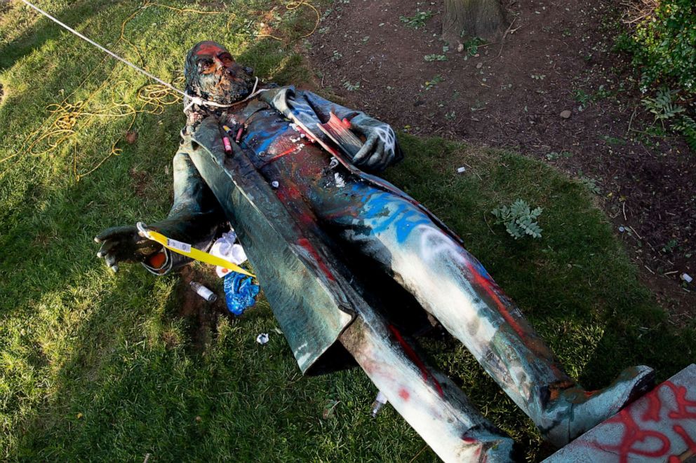 PHOTO: A statue of Confederate General Albert Pike is seen with a noose around its neck after being toppled and defaced near Judiciary Square following a day of Juneteenth celebrations in Washington, June 20, 2020.