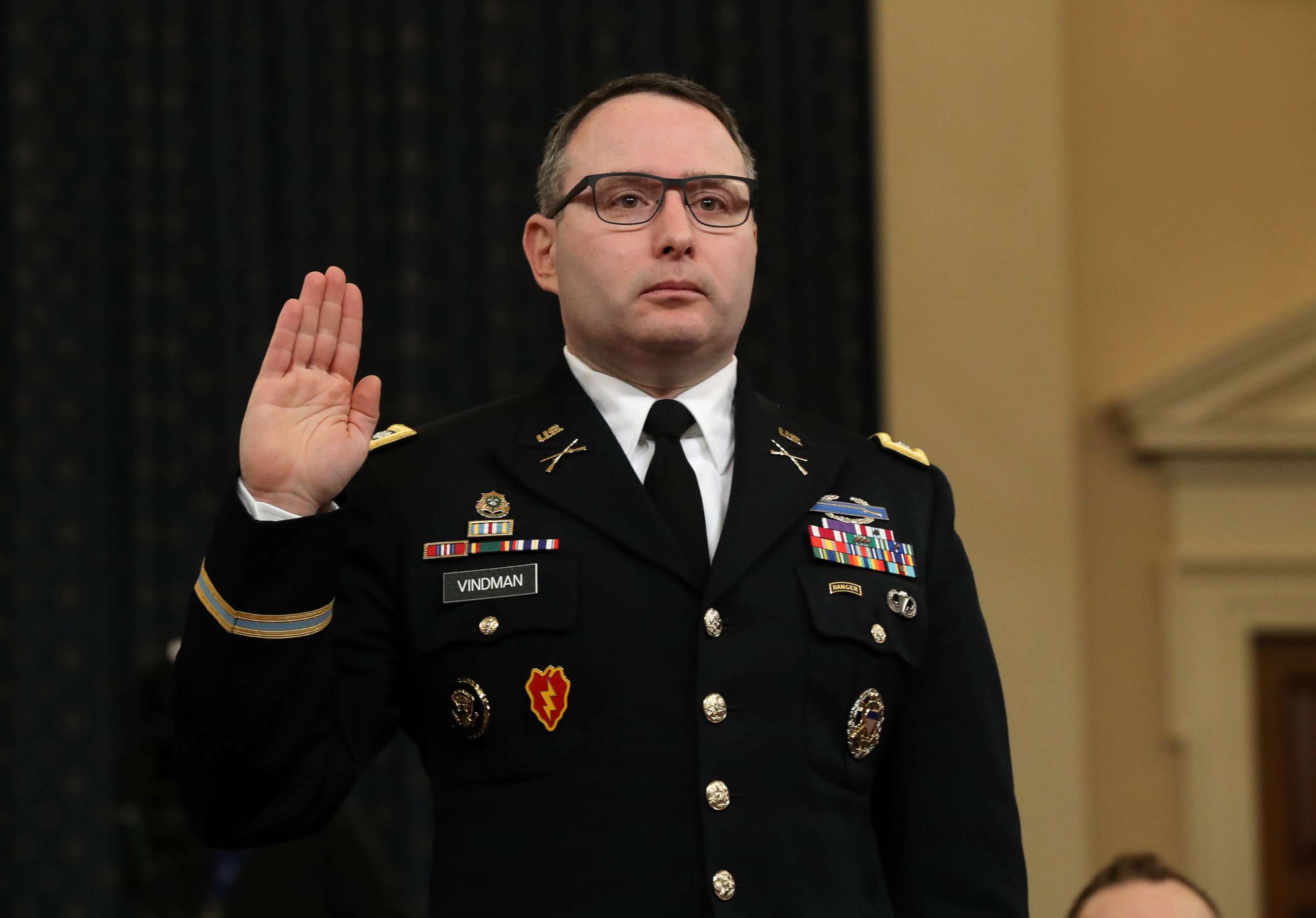 PHOTO: National Security Council Director for European Affairs Lt. Col. Alexander Vindman is sworn in to testify before the House Intelligence Committee in the Longworth House Office Building on Capitol Hill in Washington, Nov. 19, 2019.