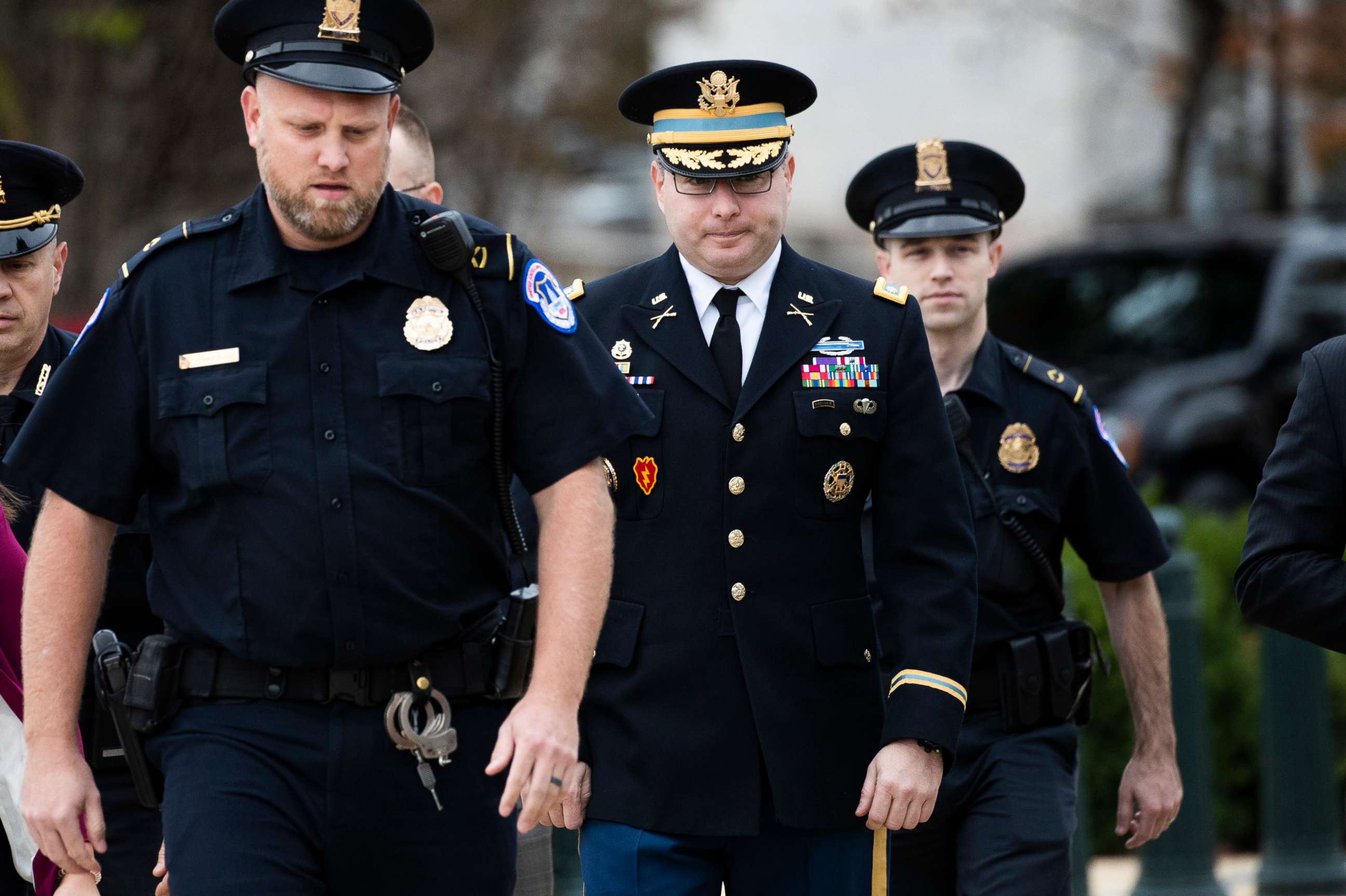 PHOTO: Army Lieutenant Colonel Alexander Vindman, a military officer at the National Security Council, center, arrives on Capitol Hill in Washington, D.C., Oct. 29, 2019.