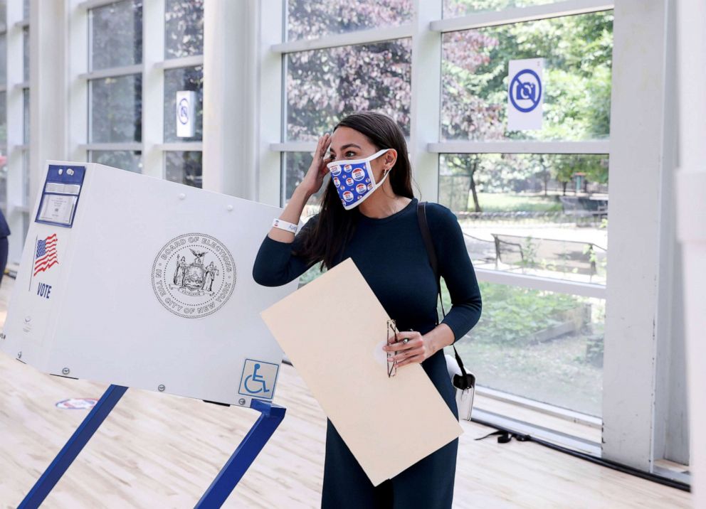 PHOTO: Rep. Alexandria Ocasio-Cortez votes early in the Democratic congressional primary election at the Justice Sonia Sotomayor Community Center in the Bronx borough of New York, June 20, 2020.