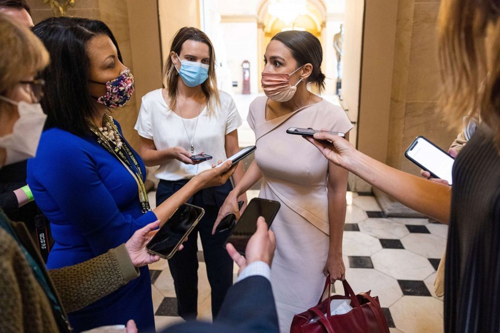 PHOTO: Democratic Representative from New York Alexandria Ocasio-Cortez speaks about her encounter with Republican Representative Marjorie Taylor Greene in the US Capitol in Washington, D.C, May 13 2021.