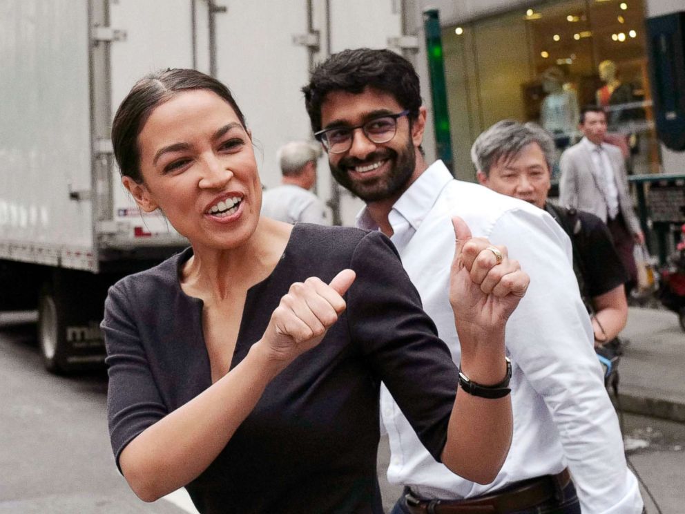 PHOTO: Alexandria Ocasio-Cortez, the winner of a Democratic Congressional primary in New York, reacts to a passerby, June 27, 2018, in New York. Ocasio-Cortez, 28, upset U.S. Rep. Joe Crowley in Tuesdays election.