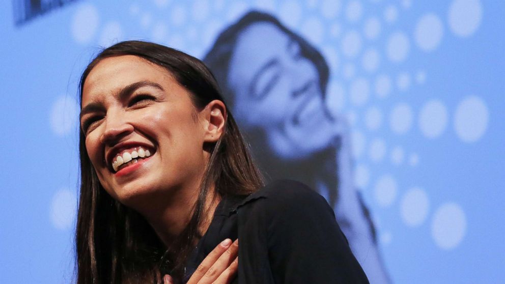 New York House candidate Alexandria Ocasio-Cortez smiles at a progressive fundraiser in Los Angeles, August 2, 2018.