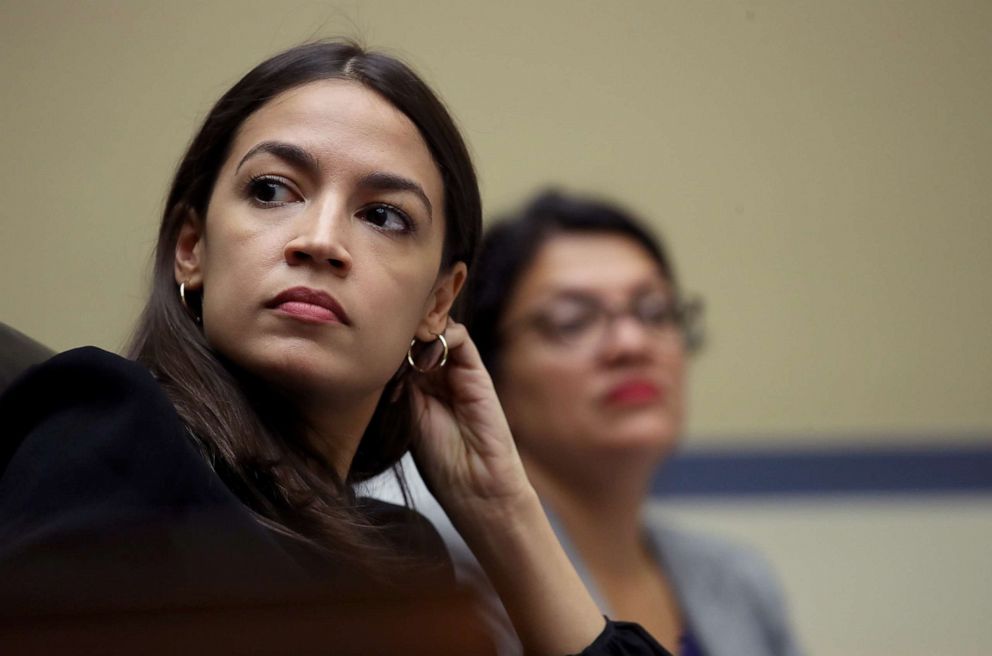 PHOTO: Rep. Alexandria Ocasio-Cortez and Rep. Rashida Tlaib listen to testimony from acting Homeland Security Secretary Kevin McAleenan while he testifies before the House Oversight and Reform Committee on July 18, 2019 in Washington.